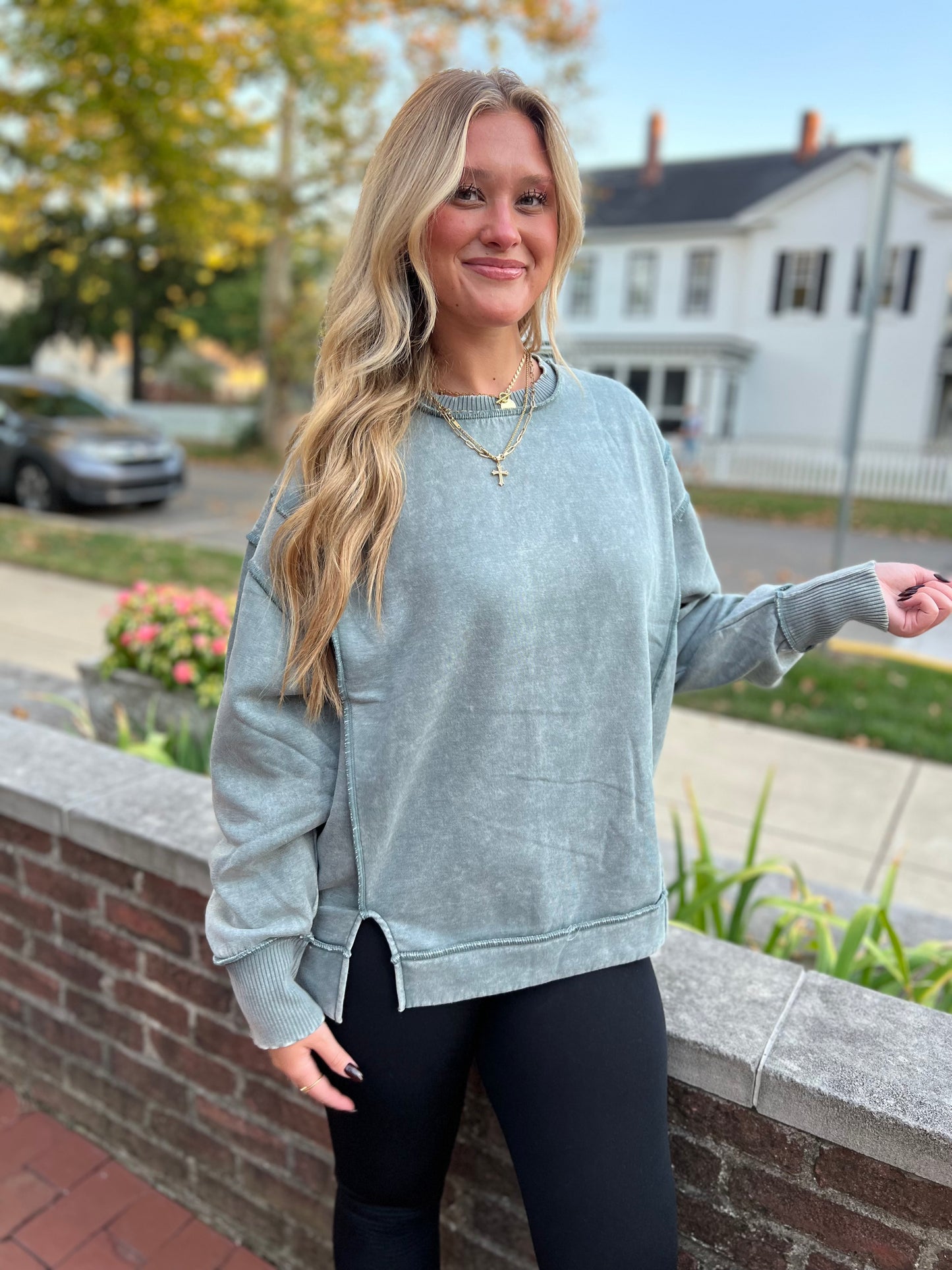 Acid wash exposed seam fleece sweatshirt
