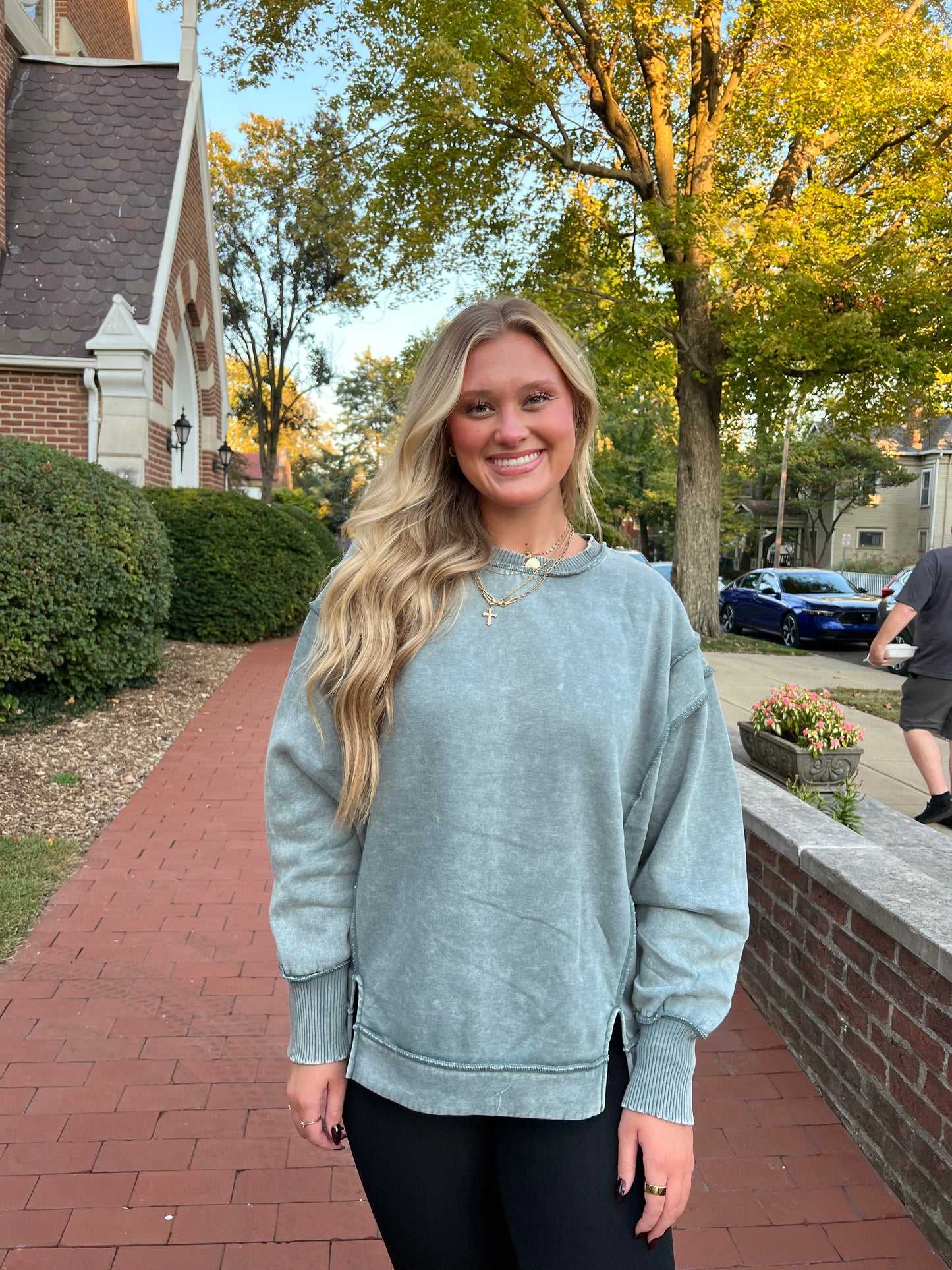 Acid wash exposed seam fleece sweatshirt