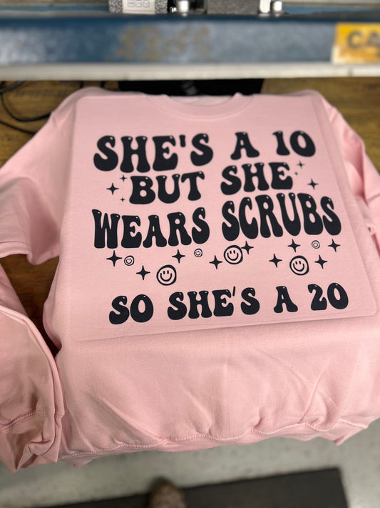 She wears scrubs crewneck