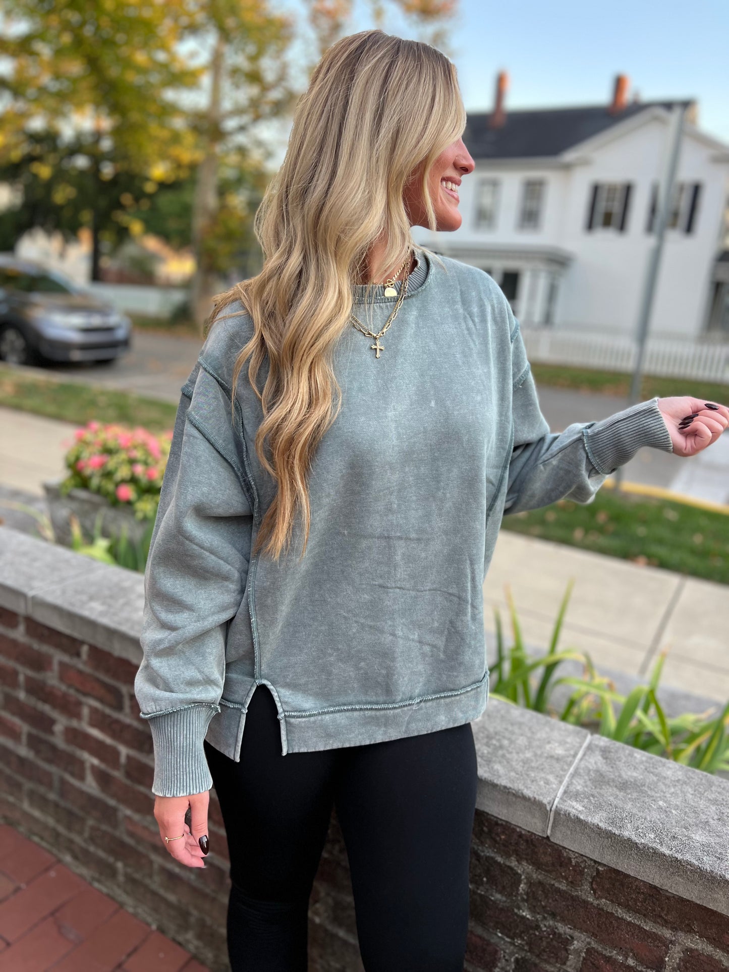 Acid wash exposed seam fleece sweatshirt